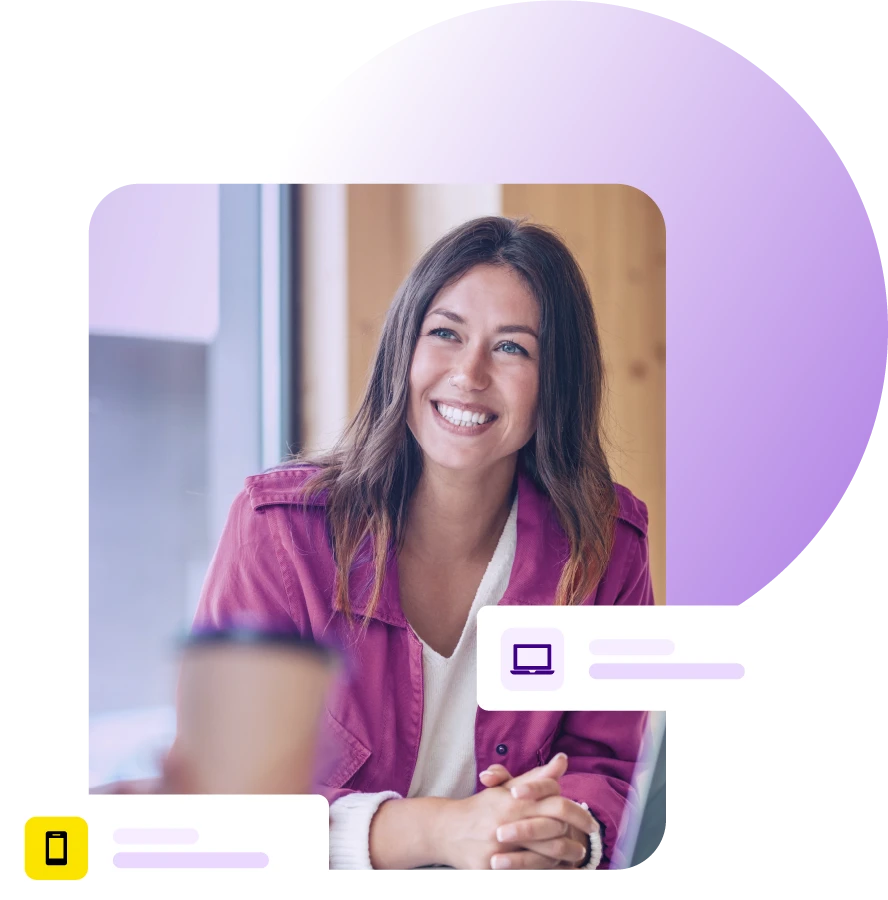 Lady smiling during a meeting with laptop on the table